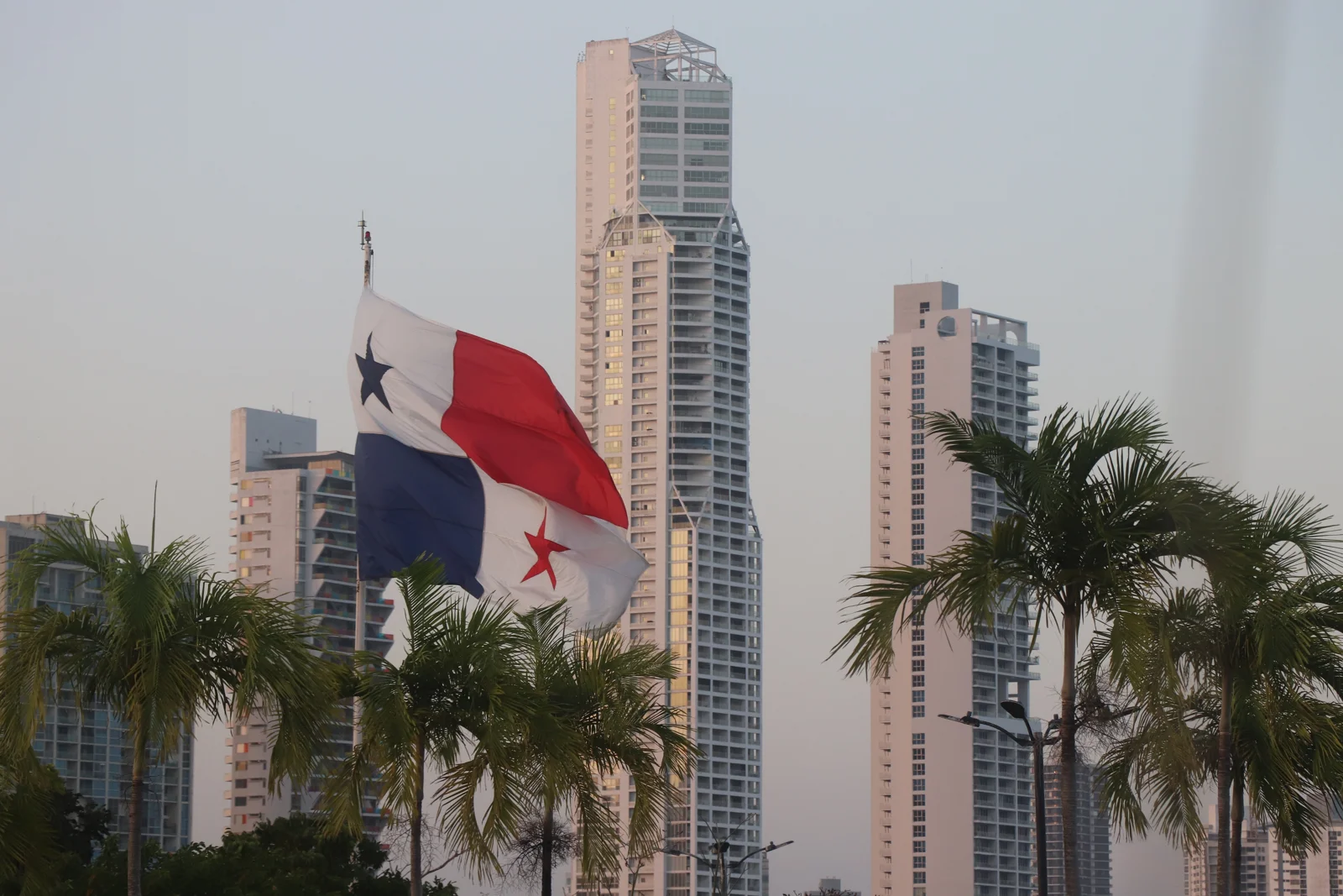 Panamanian flag against the city skyline