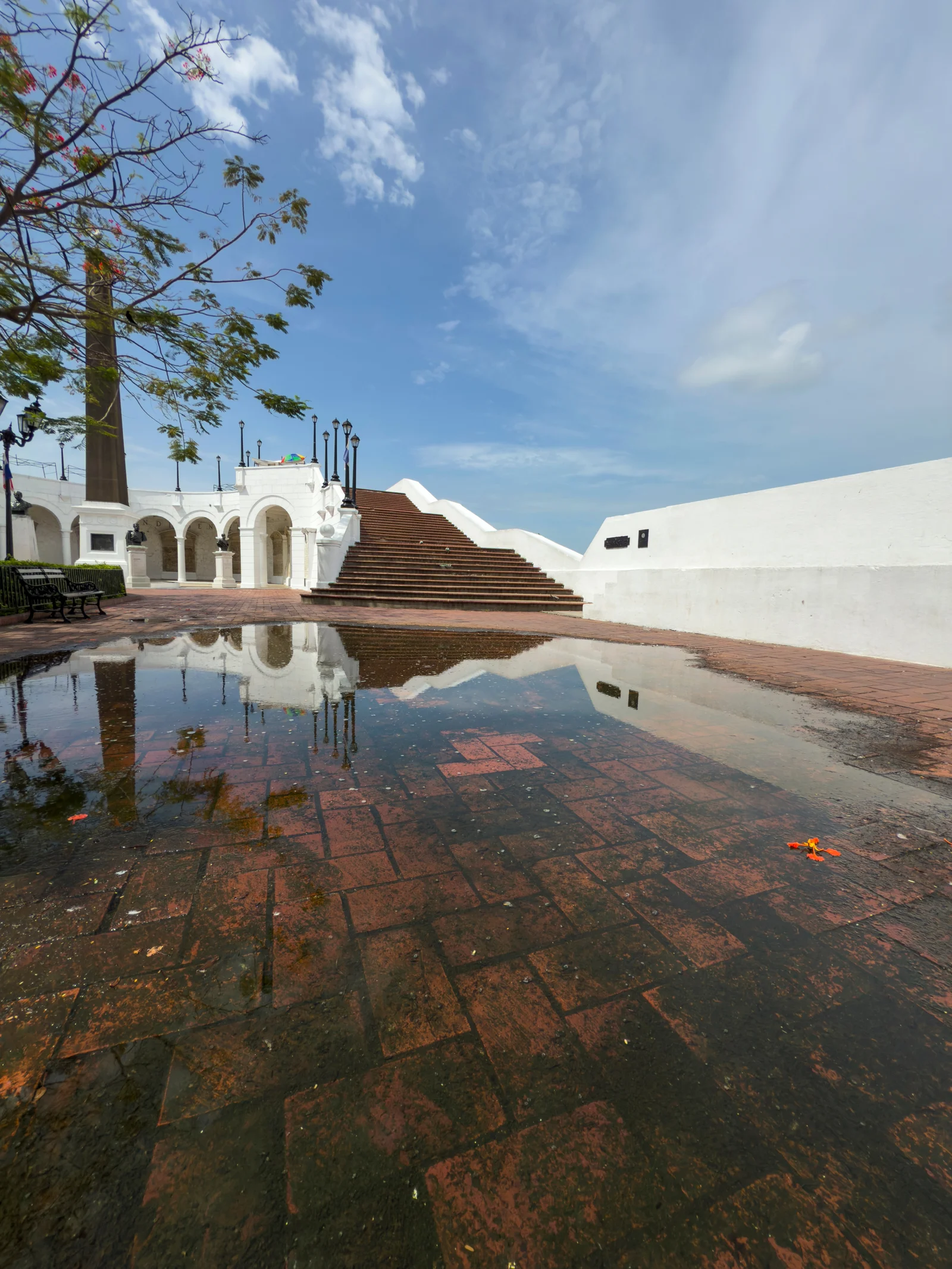 Plaza de Francia and its historic architecture reflected in water